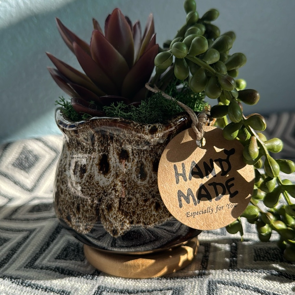Artificial Succulents in a Brown Glazed Pot